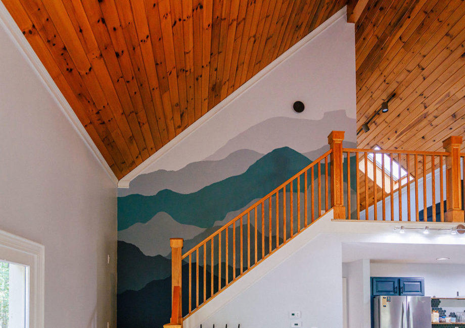 Our custom staircase mural features the Table Rock view from downtown Valdese.